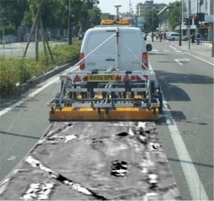 The Stream EM, known as Old Faithful, driving down a road collecting GPR survey data